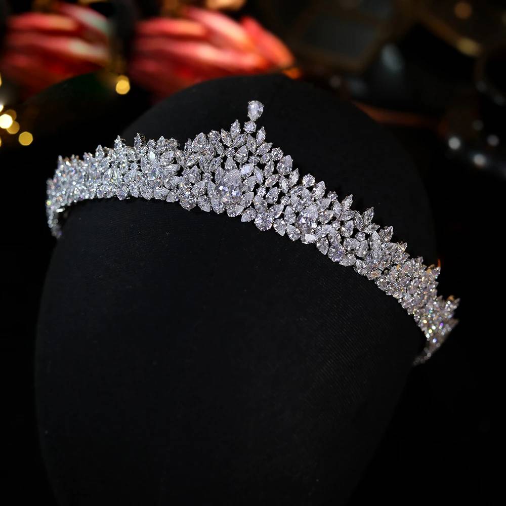 Symmetrical front profile view of the premium luxury CZ bridal tiara displayed on a black mannequin display head.