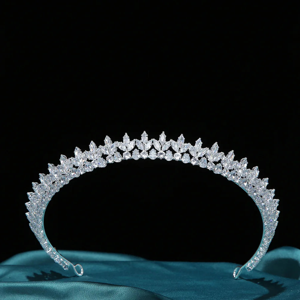 A close-up of a silver crystal wedding tiara showcasing detailed craftsmanship and sparkling cubic zirconia, perfect for weddings or special celebrations.