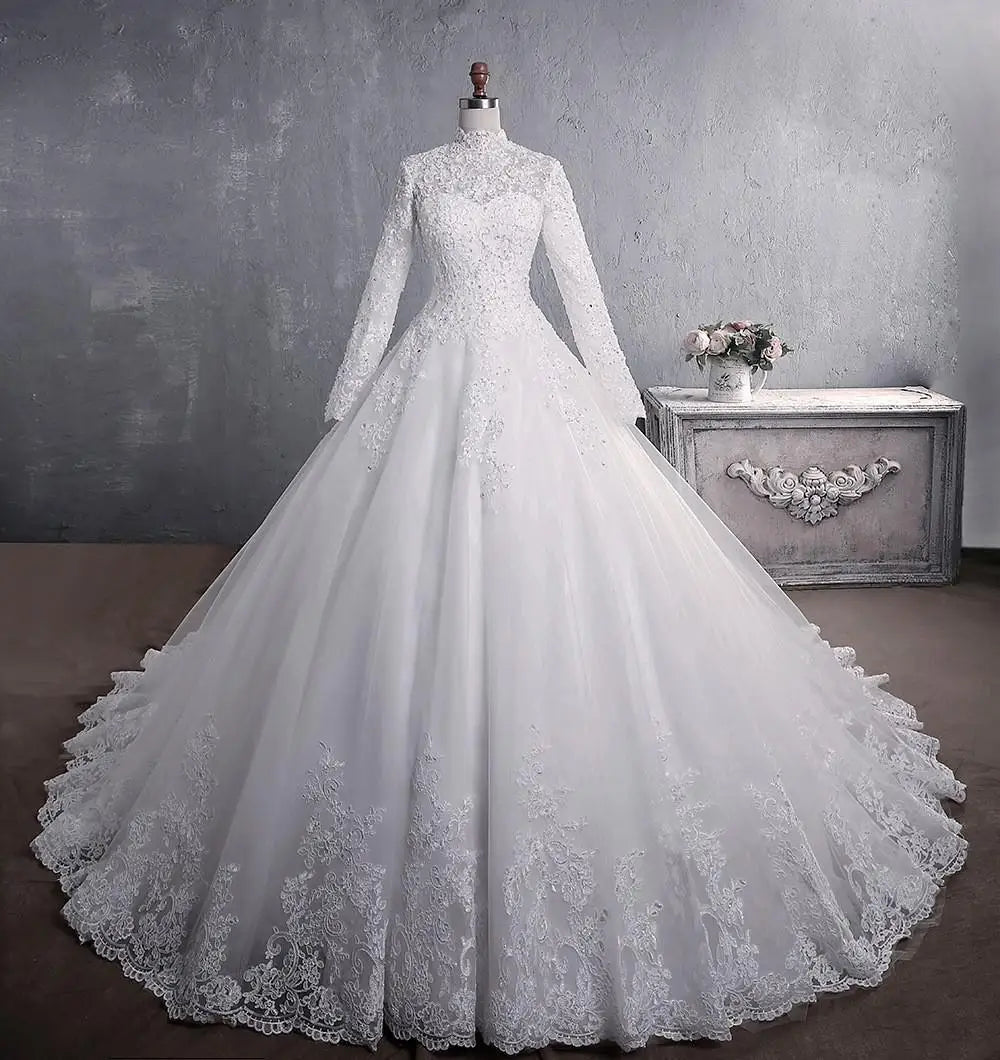 Elegant front portrait of the beaded lace plus size ball gown, showcased in a sophisticated warm champagne or light ivory tone variant under professional studio lighting.
