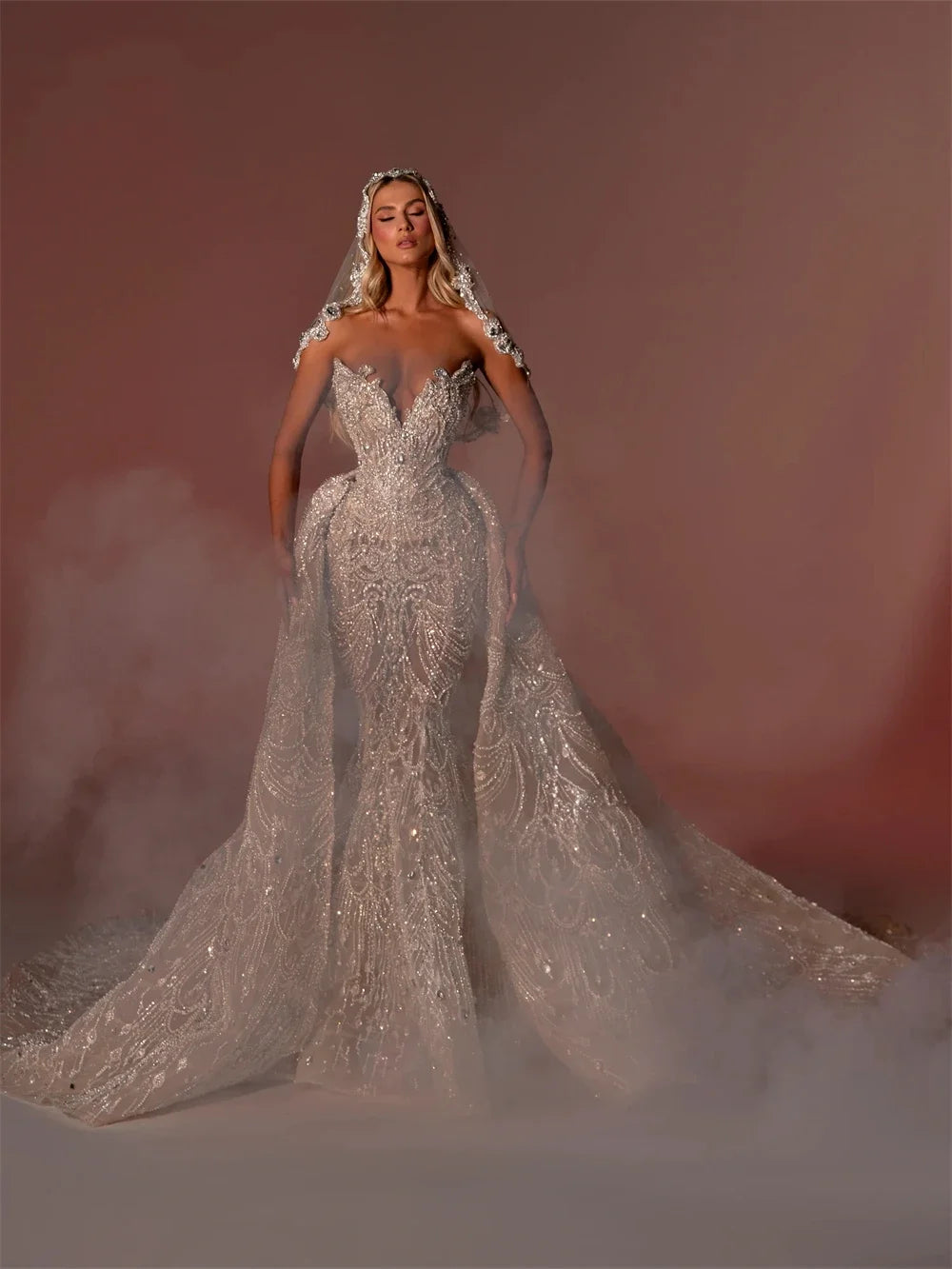 High-fashion 2-in-1 diamond-glimmer mermaid bridal gown with a structured hourglass waistline and a grand matching removable overskirt train layout.