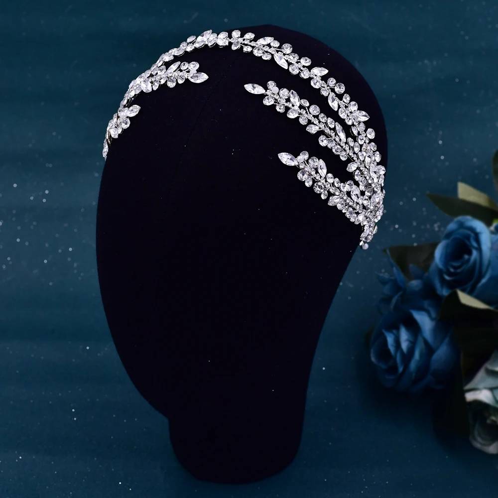 Decorative rhinestone leaf-style headband for bridal and pageant hair styling on mannequin head