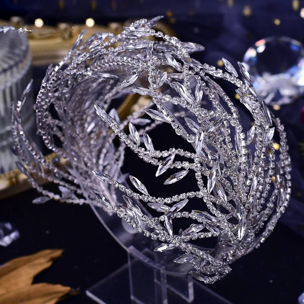 Detailed close-up of intricate crystal bridal tiara headband with leaf pattern