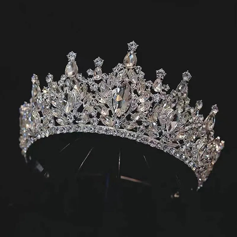 Front view of a glamorous wedding headpiece adorned with brilliant marquise and teardrop rhinestones.