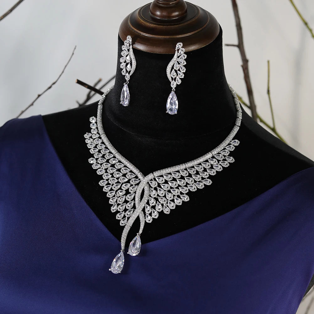 Full view of the 2pcs Dubai bridal crystal necklace and matching dropdown earrings presented on a classic display mount.