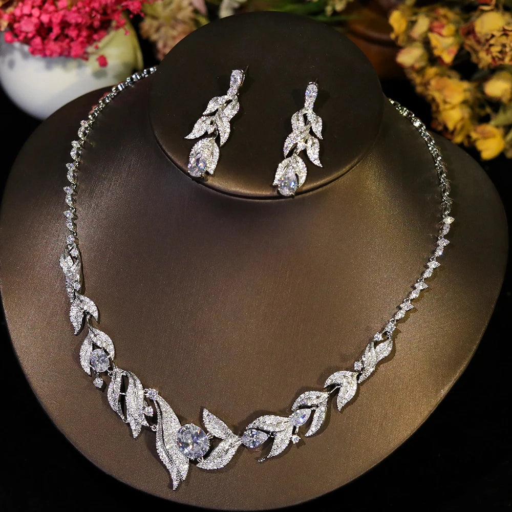 Detailed product shot of a luxury zircon wedding necklace and matching crystal drop earrings