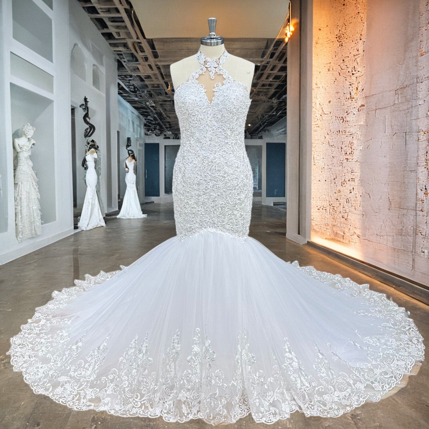 Luxury beaded lace halter mermaid wedding dress featuring a keyhole neckline cutout and a voluminous tiered tulle trumpet skirt on a mannequin.