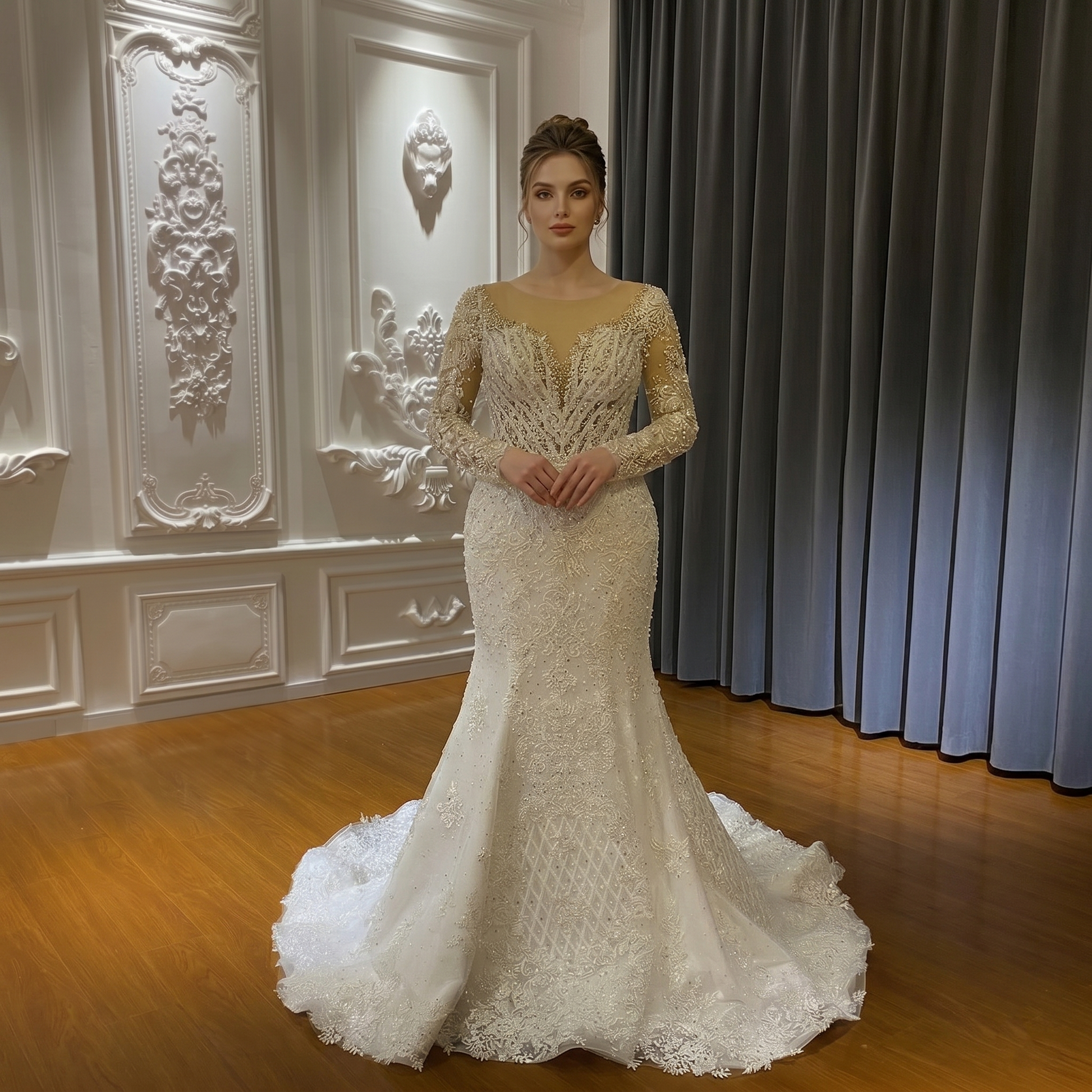 Front view of a white long-sleeved mermaid bridal gown featuring a heavily embellished lace bodice and flared skirt.