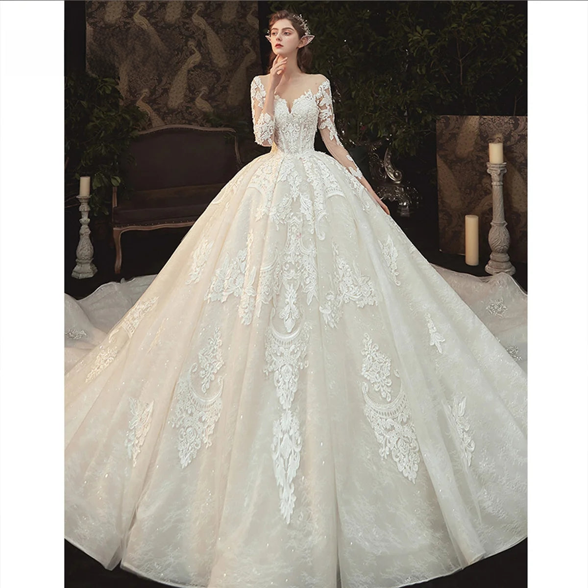 High-fashion bridal model posing in a luxury ivory long sleeve ball gown wedding dress featuring heavy dimensional lace embroidery and an ultra-voluminous royal skirt.