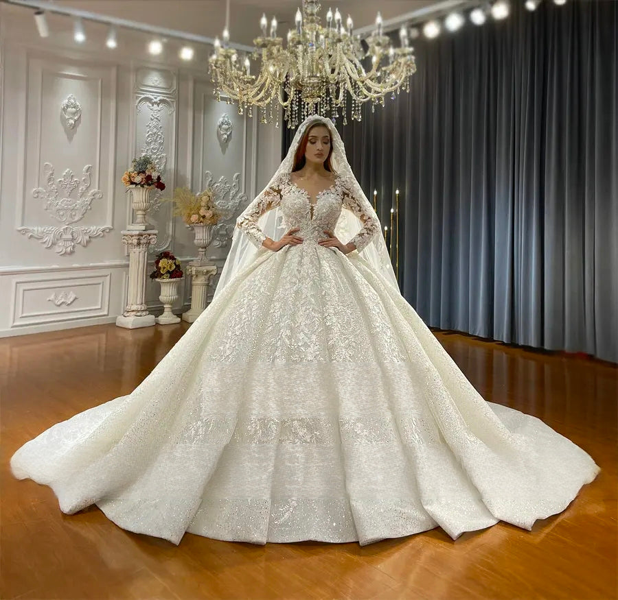 Regal front perspective of a majestic white ball gown wedding dress with sheer long sleeves and exquisite lace embroidery, emphasizing a classic fairytale silhouette for a luxury wedding ceremony.