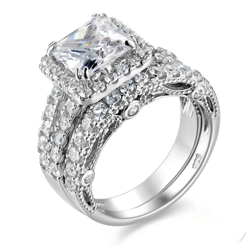 Close-up perspective of the solid 925 sterling silver bridal set showcasing the 4-carat princess-cut center stone and pave cubic zirconia bands.