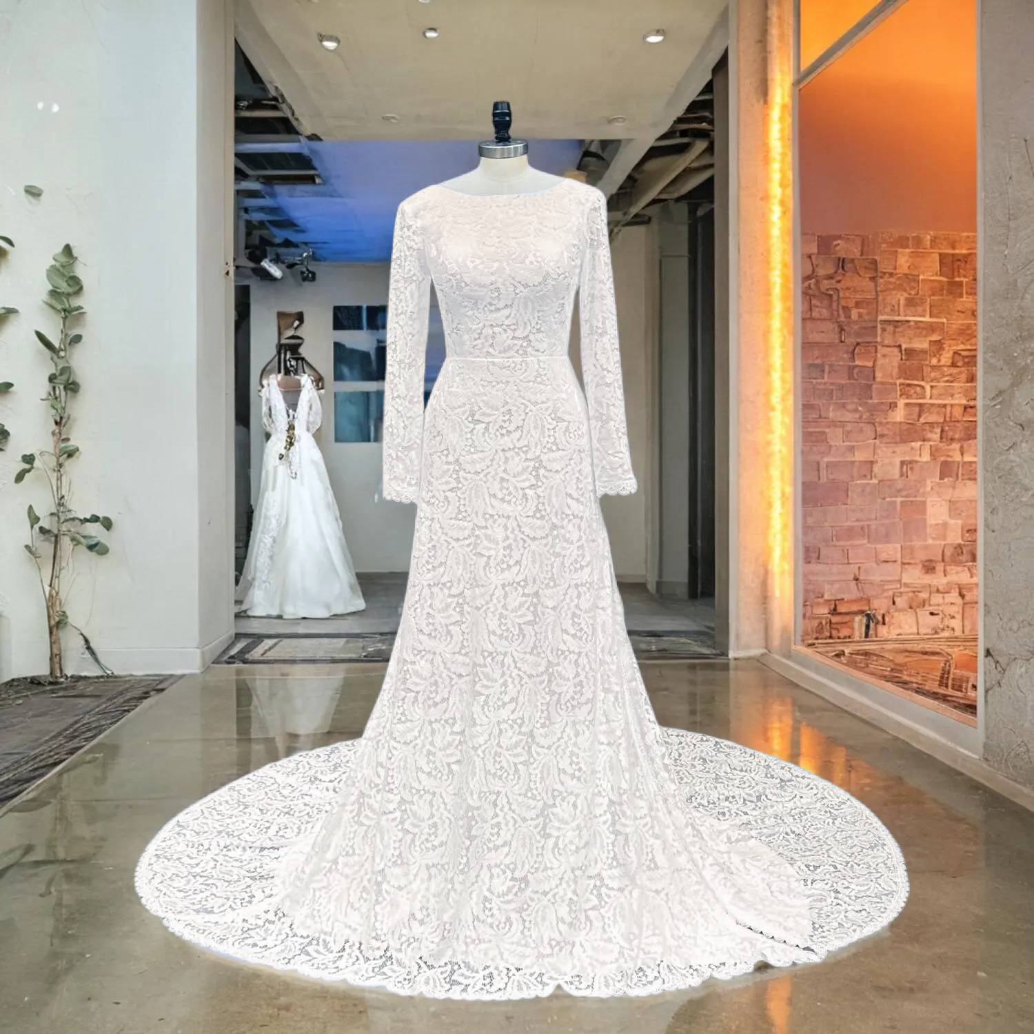 Bridal showroom perspective of an O-neck long sleeve lace wedding dress on a mannequin, illustrating the elegant textures and classic circular train.
