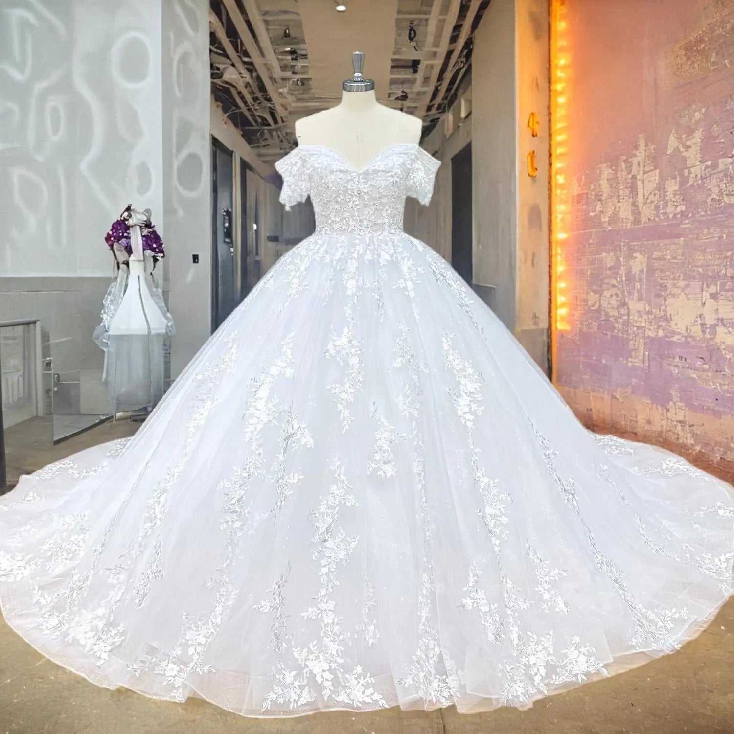 Front view of the off-shoulder sequin beaded ball gown wedding dress on a mannequin, showcasing the elegant sweetheart neckline and grand ball gown silhouette.