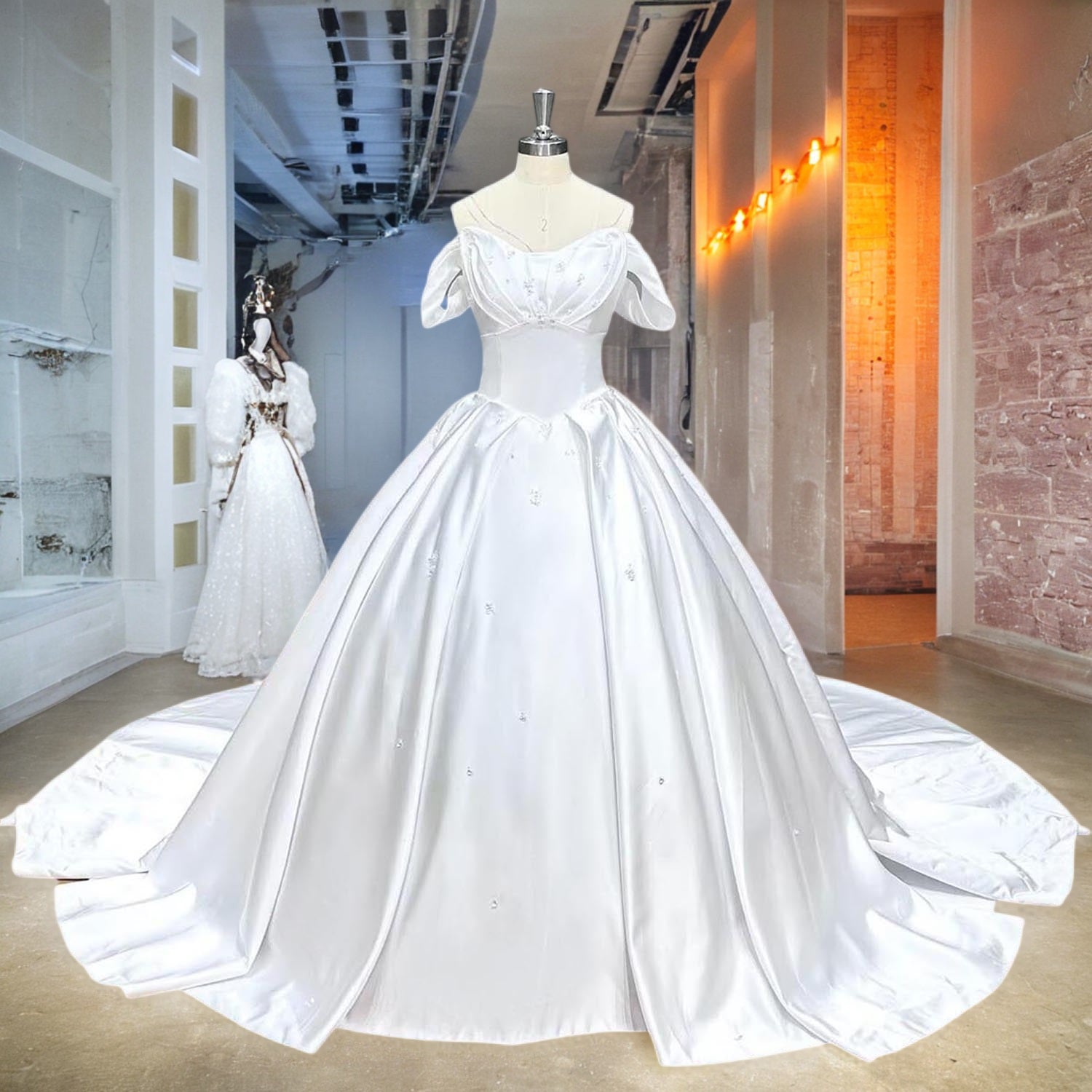Timeless white satin wedding dress with draped off-the-shoulder sleeves and a voluminous pleated skirt displayed on a mannequin in a modern showroom corridor.