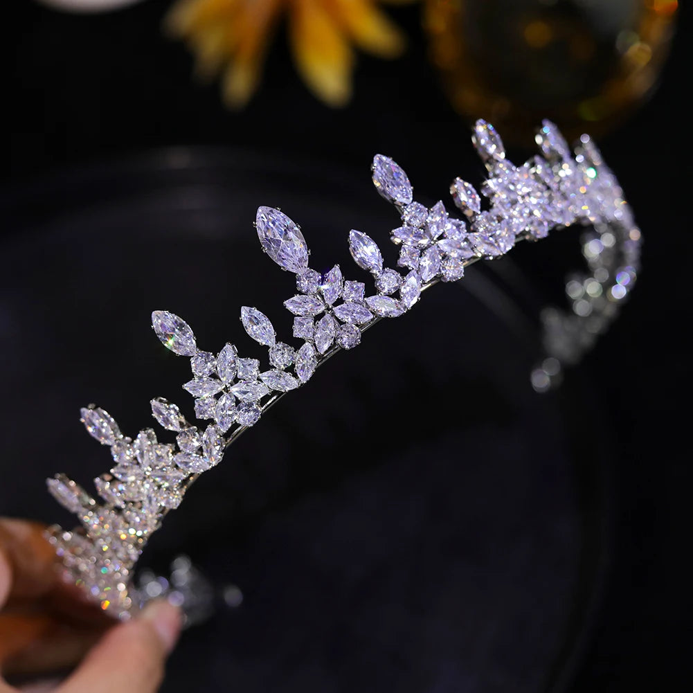 Detailed close-up of the sparkling marquise rhinestones on a silver princess crown hairband
