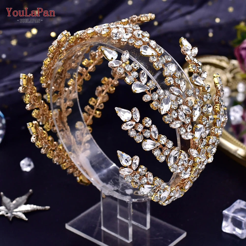 Close-up side profile view of a gold-plated option for the rhinestone wedding headpiece tiara featuring sparkling crystal leaf branches.