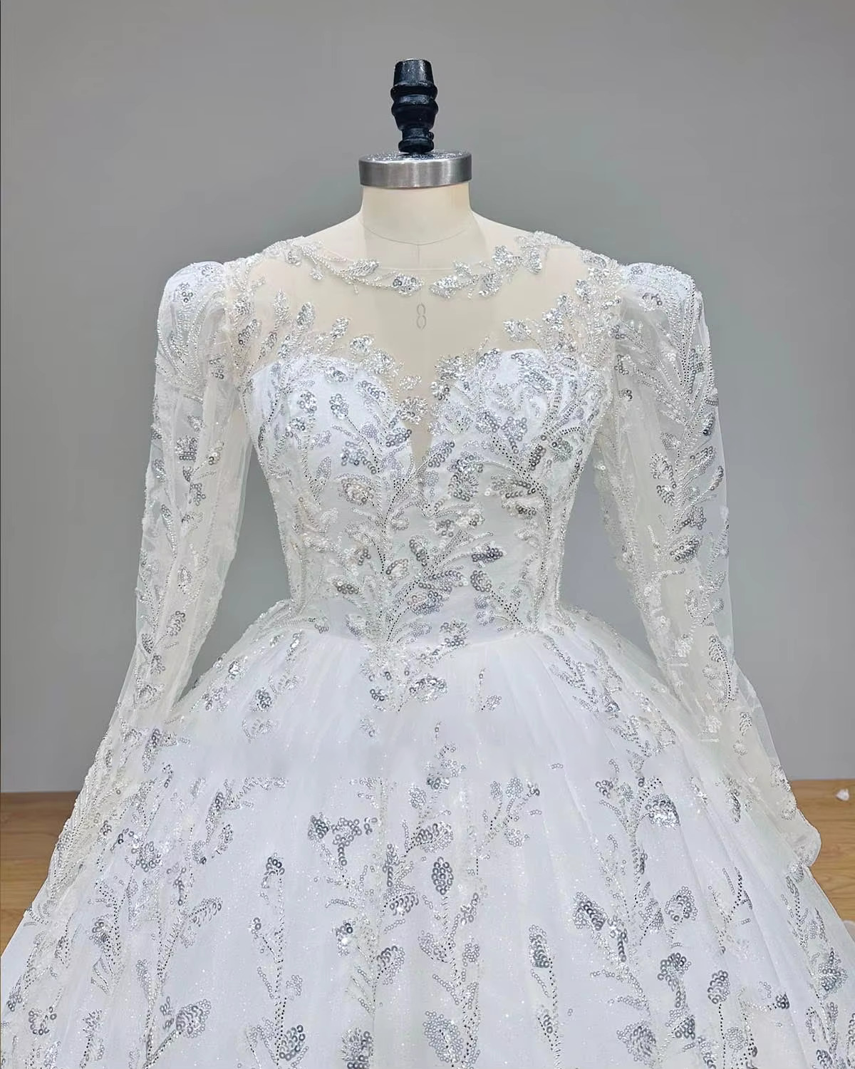 Full-length studio display of the vintage glitter ball gown wedding dress, showcased in a crisp, bright white color option for a classic princess aesthetic.