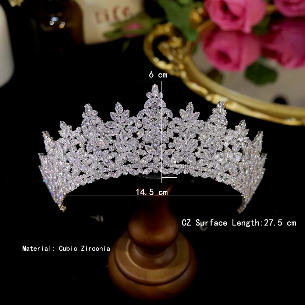 Sizing chart metric schematic overlay on a silver floral CZ wedding tiara, highlighting its 6cm peak height and 27.5cm total surface length.