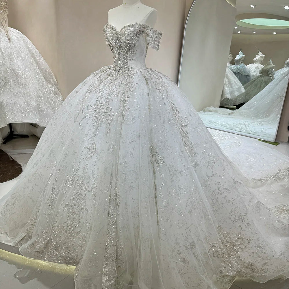 Gorgeous White Off-Shoulder Sleeveless Wedding Dress with Long Elegant Train