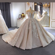 Luxury Off-Shoulder Beaded Wedding Dress with Elegant Long Train for Brides