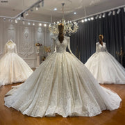 New Model Elegant Lace Bridal Dress with Deep V-Neckline and Modern Silhouette