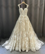 Romantic Beach Style A-Line Lace Bridal Dress with Flowing Skirt and Elegant Detailing