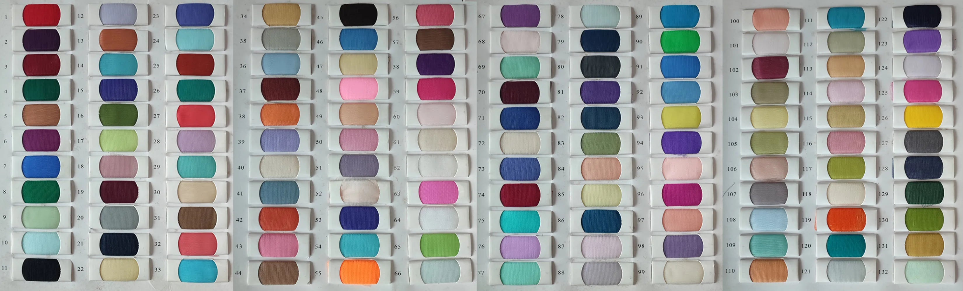 Detailed fabric color swatch chart for the Sansa glitter lace evening dress, displaying a wide range of available color options for custom orders.
