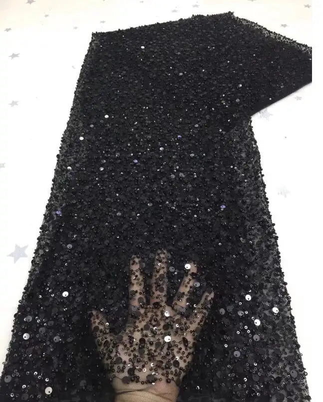 Texture detail of premium gold sequin lace fabric, perfect for high-end wedding and evening gown detailing.