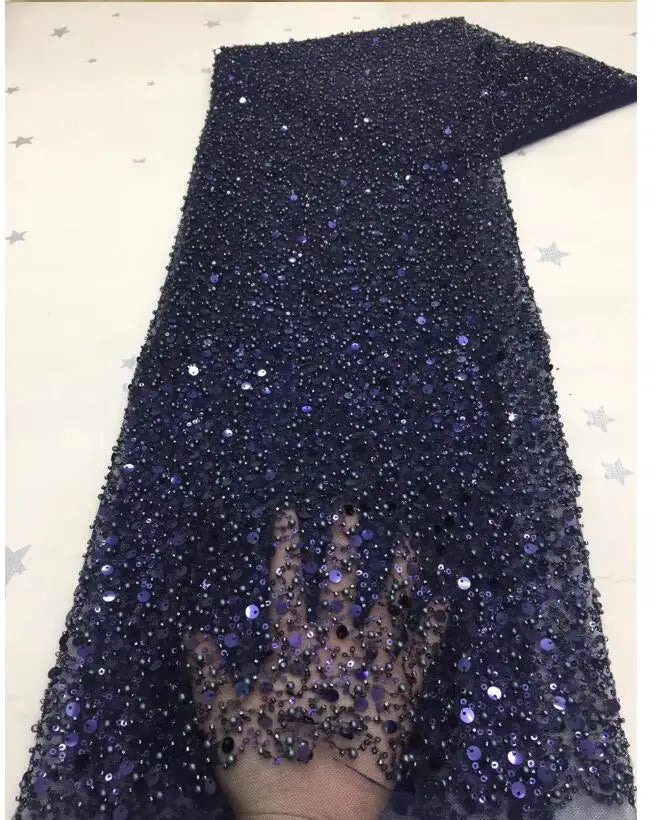 A diverse selection of colored sequin lace fabric swatches, offering various customization options for bridal and formal attire.