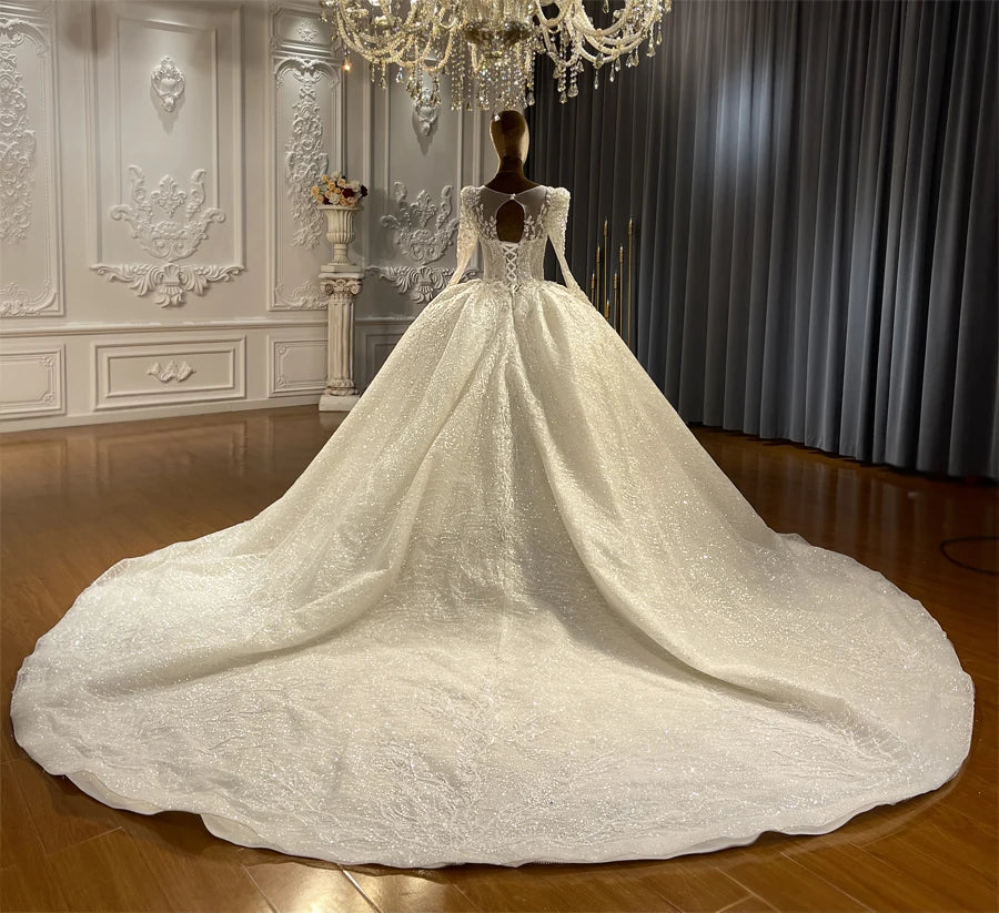 Luxury Lace Appliqued Wedding Dress with Heavy Beading and Elegant Detailing