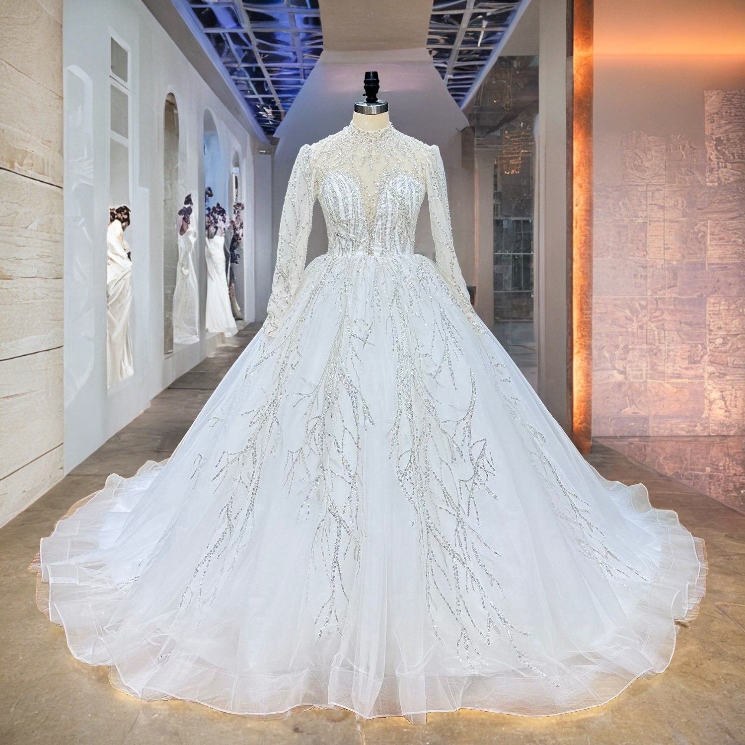 Full front view of a glittering high neck long sleeve ball gown wedding dress on a showroom mannequin.