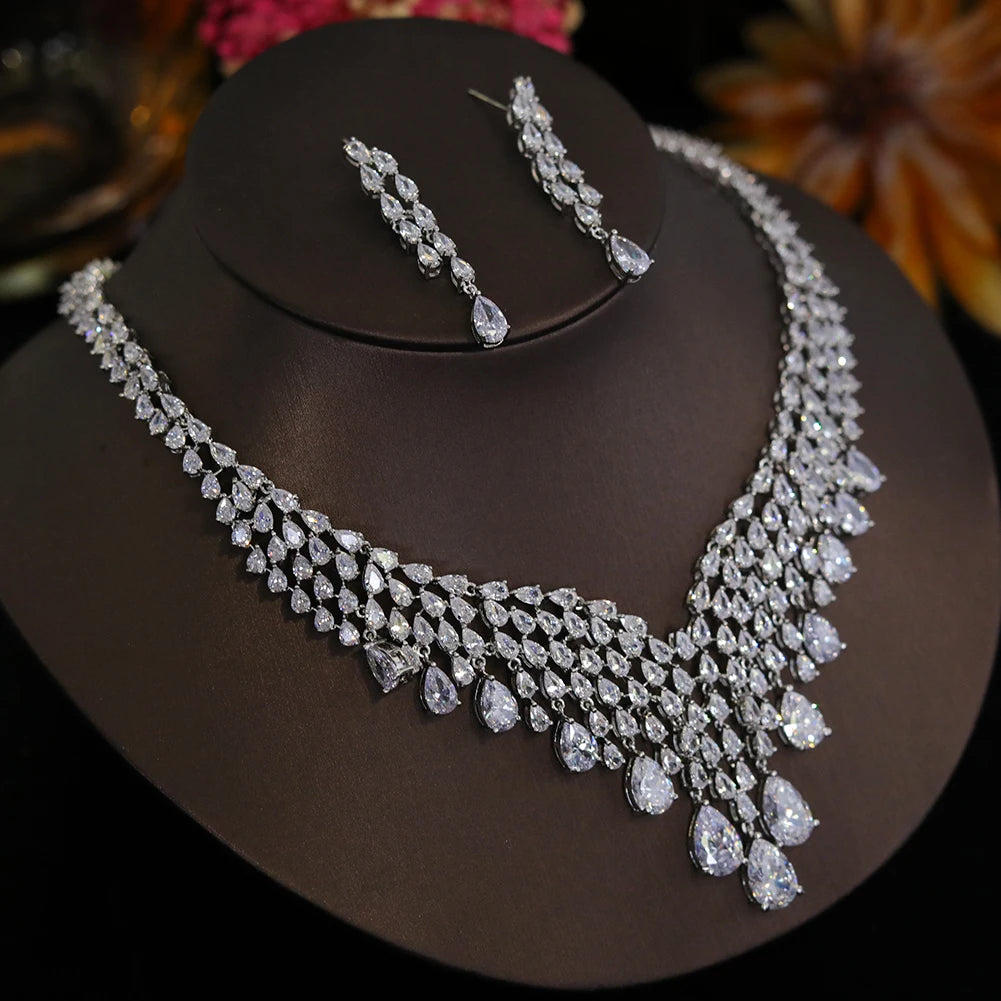 Side-angle display of a premium 2pcs bridal necklace and earring set highlighting the brilliant pave crystal design.