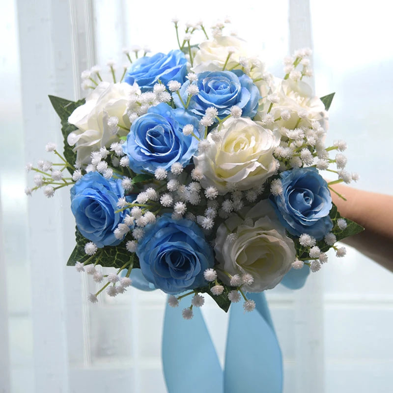 Vibrant light blue and cream white silk rose bridal bouquet surrounded by clusters of delicate faux baby's breath.