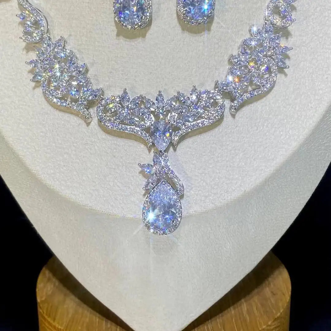 Close-up macro shot of the detailed teardrop pendant on a sparkly zircon crystal bridal necklace.