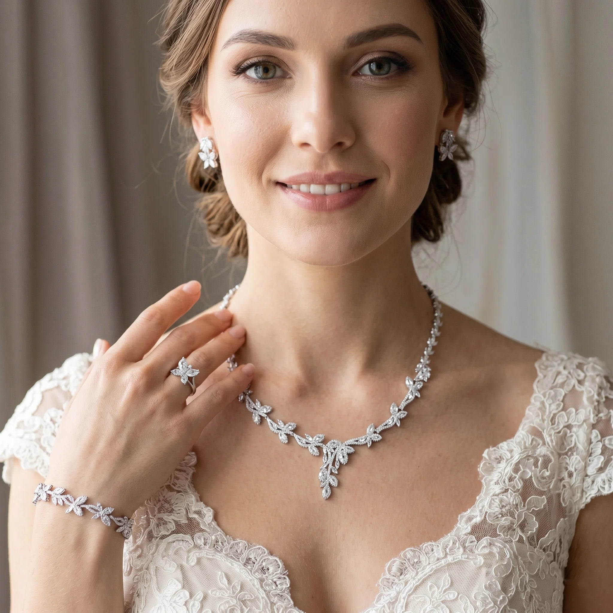 Smiling model wearing a trendy luxury 4PCS zirconia wedding jewelry set with a Dubai-inspired branch necklace, bracelet, butterfly ring, and earrings.