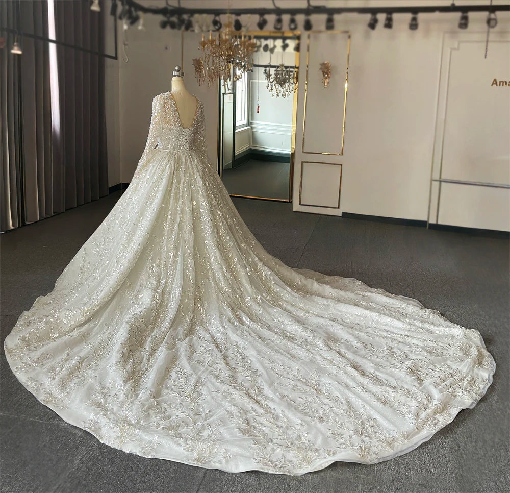 Three-quarter front angle of the sparkly mermaid wedding gown, highlighting the high-fashion fit-and-flare design and premium heavy beading craftsmanship.