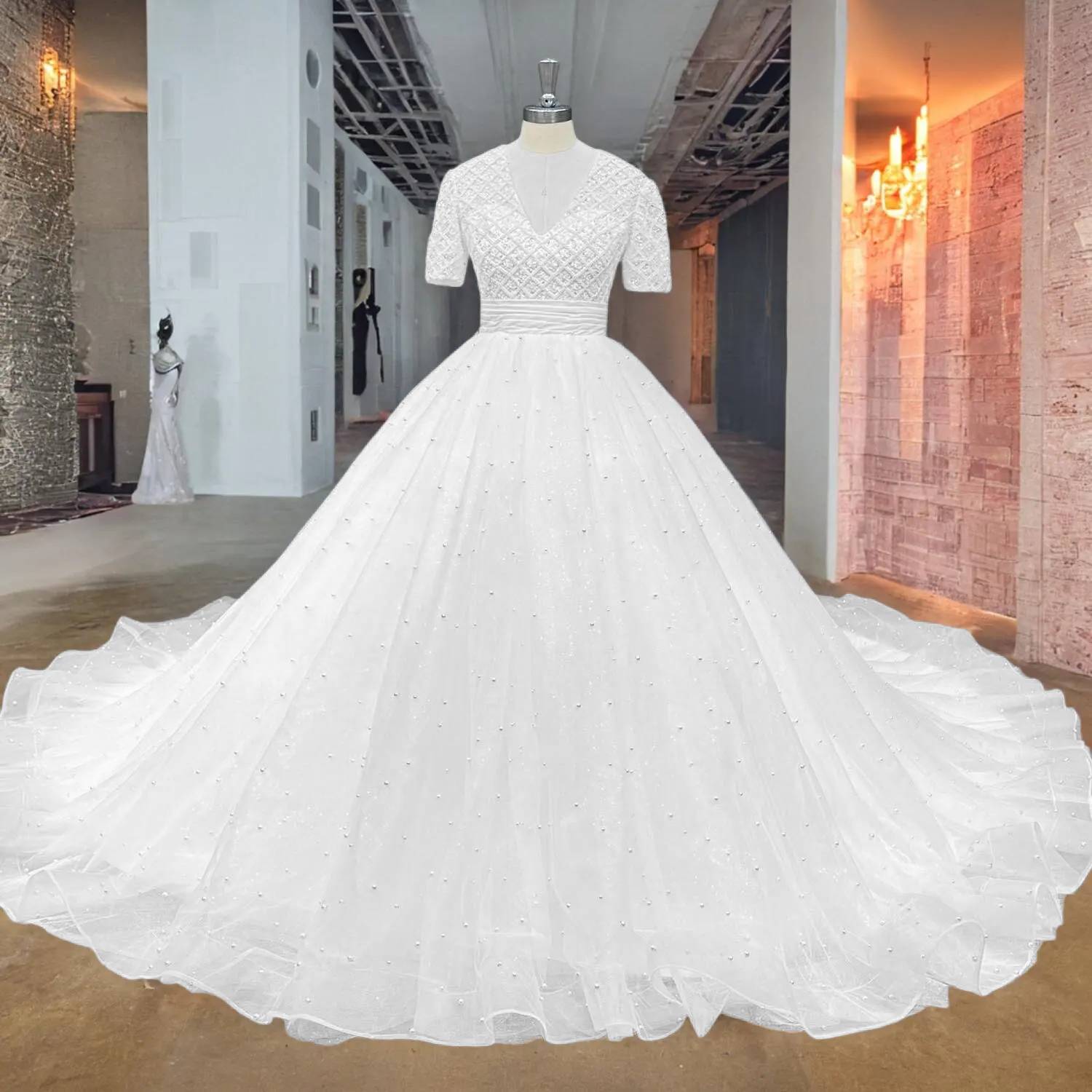 Full-length front view of a shimmering pearl-studded ball gown wedding dress with a V-neckline and short sleeves on a plain background.