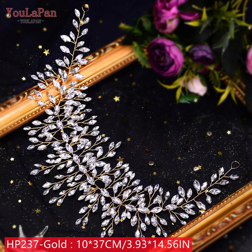 Flat lay product view of a premium crystal bridal hair accessory, showcasing texturized marquise-cut rhinestones forming large flower vine clusters.