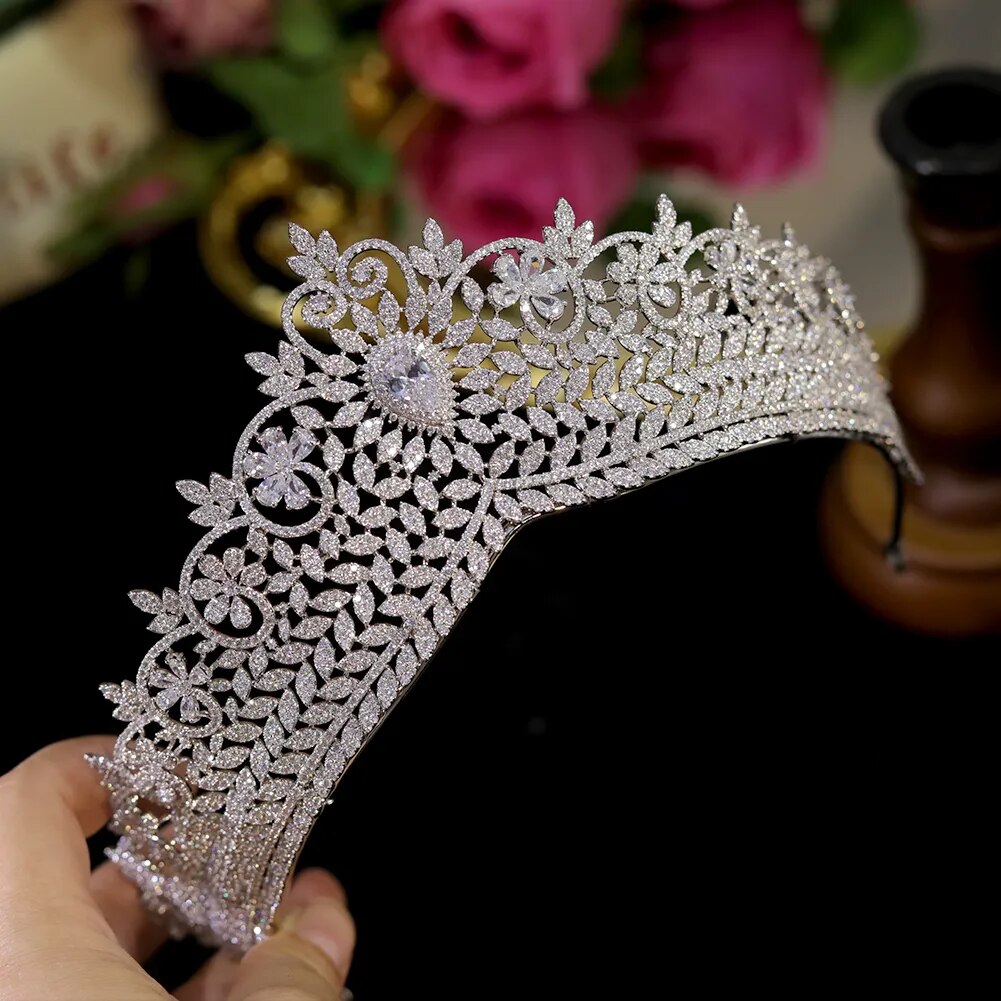 Intricate detailing of a handmade marquee cut cubic zirconia bridal crown headband showing the leaf design embellishments.