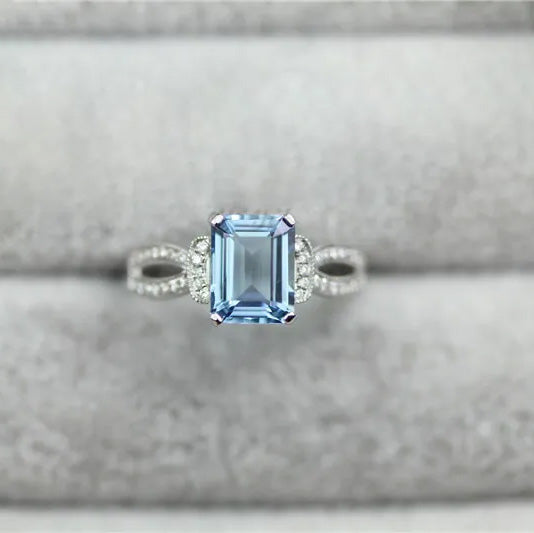 Blue 1.25ct Aquamarine and 0.23ct Natural Pave Diamond Ring