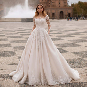 Sexy Illusion Lace A-Line Princess Wedding DressLuxury Appliques Button Court Train Bride Gown