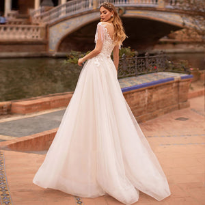 Sexy V Neck Pearls Tassel Lace A-Line Wedding Dress Luxury Appliques Sweep Train Bride Gown