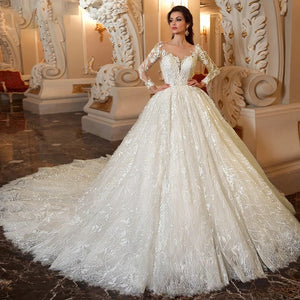 Sexy Illusion Long Sleeve Lace Ball Gown Wedding Dress Beaded Flowers Chapel Train Bridal Gown