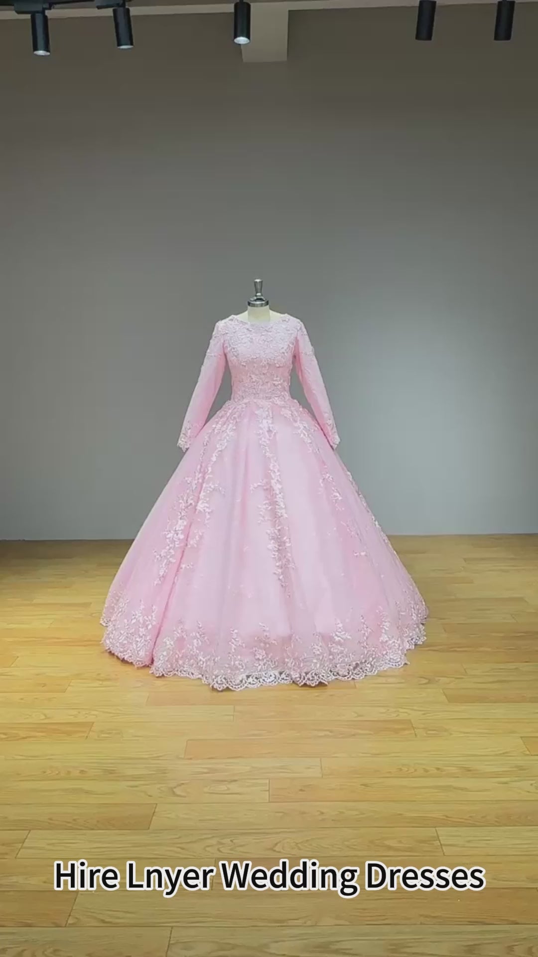 Charger la vidéo : Long Sleeve Ball Gown Wedding Dress with Lace Up Back and Crystal Appliques