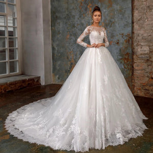 Sexy Illusion Long Sleeve Lace A-Line Wedding Dress Luxury Scoop Neck Appliques Court Train