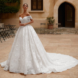 Sexy Boat Neck Backless Lace A-Line Princess Wedding Dresses Luxury Beaded Bridal Gown
