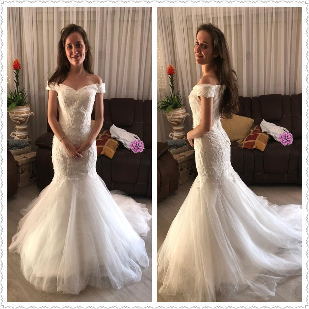 A happy bride wearing an elegant off-shoulder mermaid wedding dress, captured from front and side angles in a home setting.
