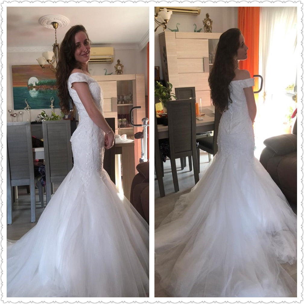 Side-by-side view of a bride modeling a floor-length mermaid bridal gown with off-shoulder sleeves and a detailed back.