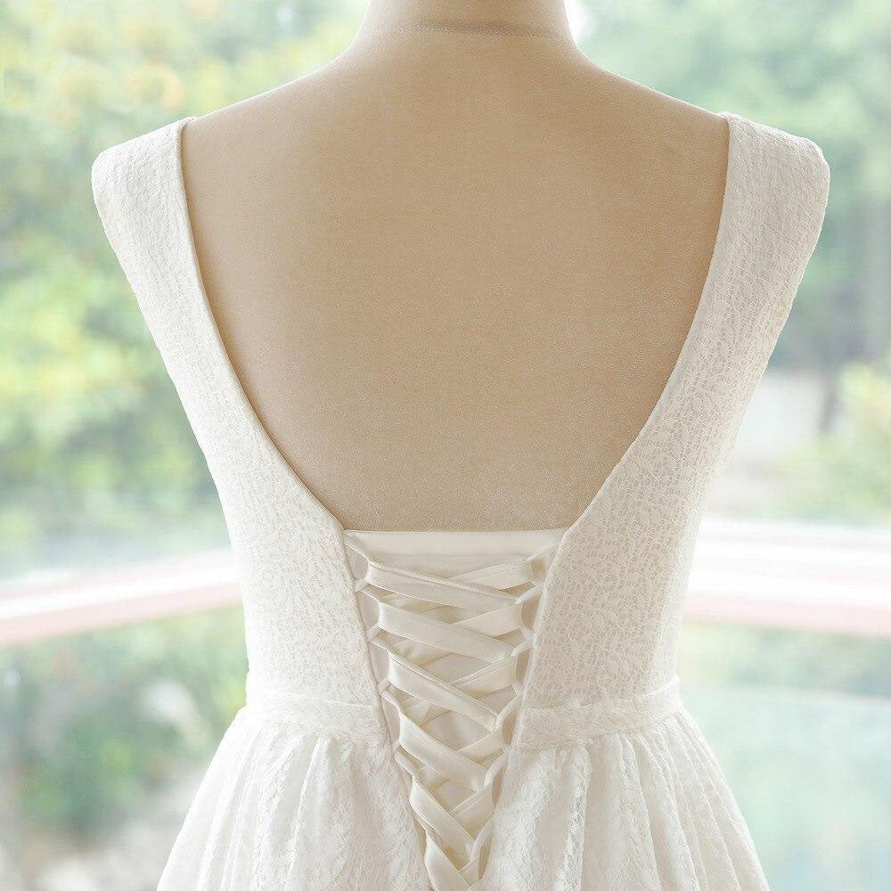 Back view of the bodice on a lace wedding dress, highlighting the corset-style lace-up closure.