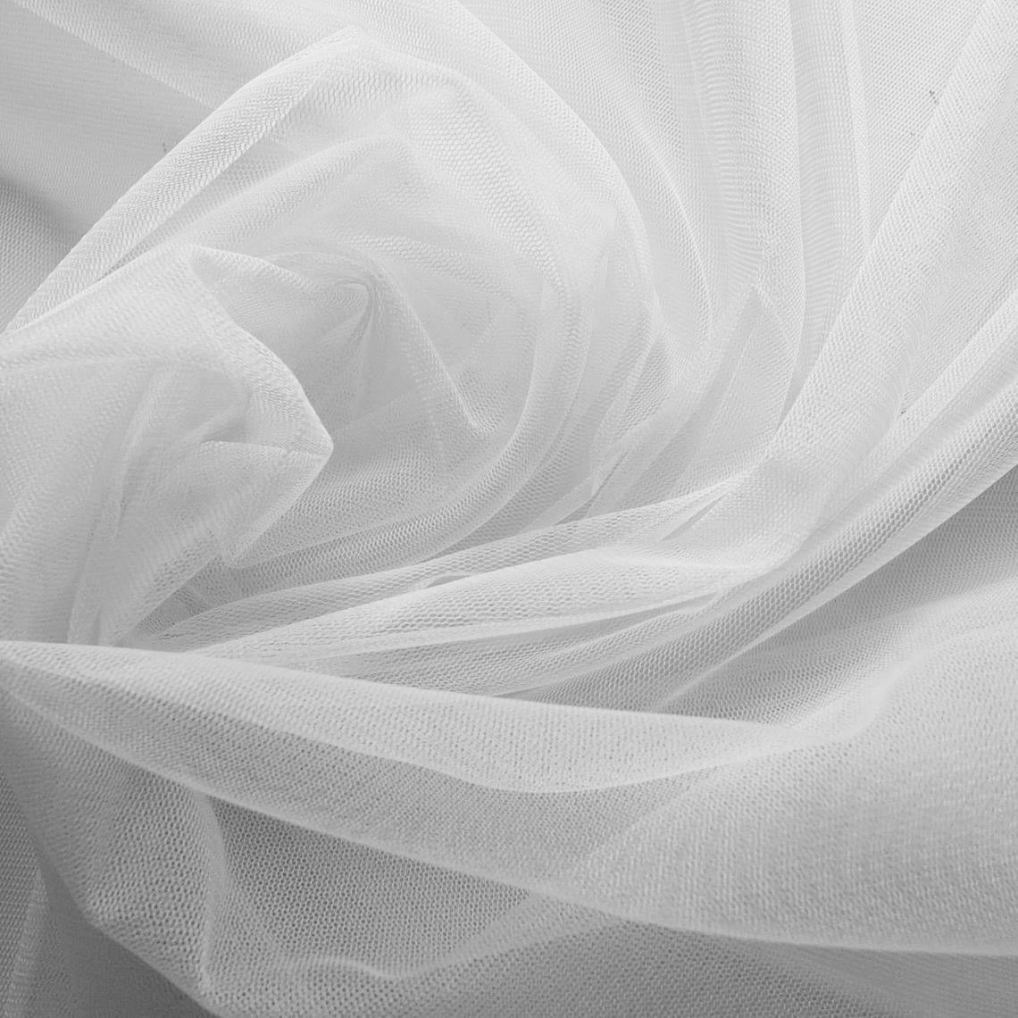 A detailed close-up of a crisp, white sheer tulle fabric, showcasing its fine mesh quality for bridal fashion design.