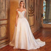 Luxury off-shoulder A-line satin wedding dress featuring an intricately beaded bodice and a flowing skirt.
